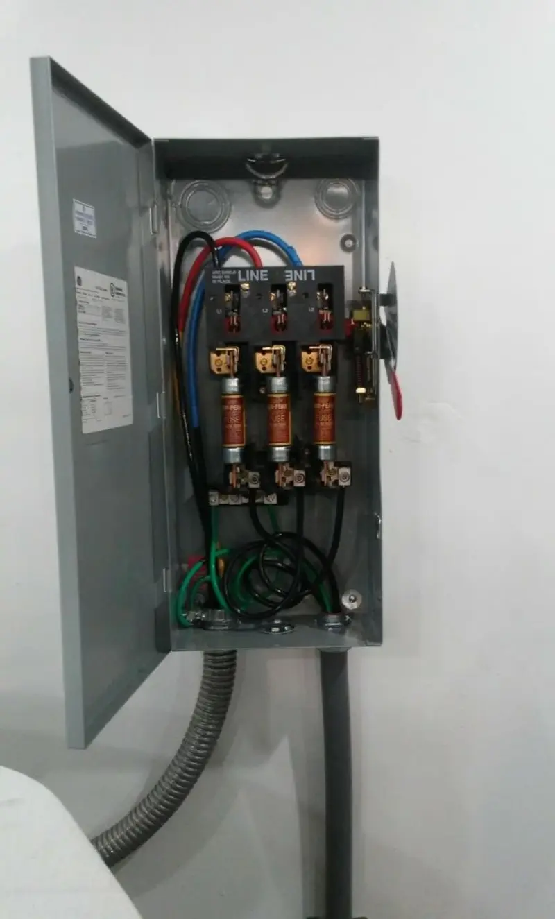 Three-phase disconnect switch installed for Smoke Detector Installation in Melrose